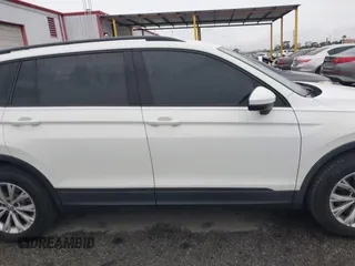 2019 Volkswagen Tiguan S z VIN 3VV1B7AX7KM018189, wystawiony jako IAAI lot #41741924 z przebiegiem 61 740 mil mil oraz . Historia ofert i sprzedaży dostępna na DreamBid. Obrazek 13.