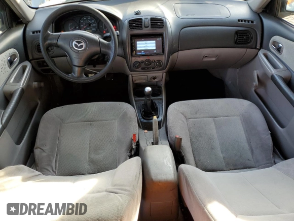 2002 Mazda Protege DX with VIN JM1BJ225120605237, listed as a Copart auction lot 49331225 with 184,556 mi miles and Salvage Title. Bid and sale history available at DreamBid. Image 8.