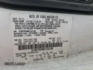 2011 Ford Police Interceptor with VIN 2FABP7BV8BX160188, listed as a Copart auction lot 59710915 with 142,316 mi miles and Salvage title. Bid and sale history available at DreamBid. Image 12.