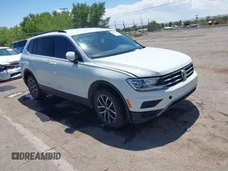 2018 Volkswagen Tiguan SEL with VIN 3VV2B7AX7JM138559, listed as a IAAI auction lot 42564565 with 74,602 mi miles and . Bid and sale history available at DreamBid. Image 1.