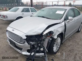 2014 Ford Fusion Energi Titanium with VIN 3FA6P0SU8ER256924, listed as a IAAI auction lot 41460304 with 1 mi miles. Bid and sale history available at carsss.com. Image 6.