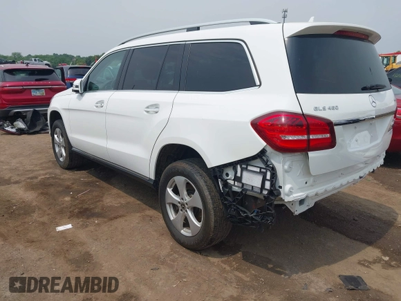 2018 Mercedes-Benz GLS 450 with VIN 4JGDF6EE2JB023644, listed as a IAAI auction lot 42431579 with 95,940 mi miles and . Bid and sale history available at DreamBid. Image 3.