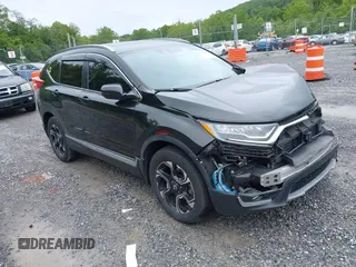 2019 Honda CR-V Touring с VIN 7FARW2H97KE017407, выставлен на аукционе IAAI как лот 42357015 с пробегом 79 418 миль миль и . История ставок и продаж доступна на DreamBid. Изображение 1.