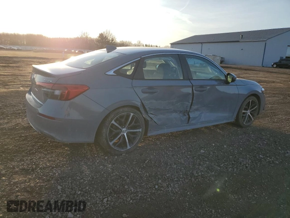 2022 Honda Civic Touring z VIN 2HGFE1F90NH324934, wystawiony jako Copart lot #48501555 z przebiegiem 99 825 mil mil oraz Szkoda całkowita • Salvage title. Historia ofert i sprzedaży dostępna na DreamBid. Obrazek 3.