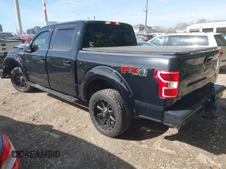 2018 Ford F-150 XL with VIN 1FTEW1E50JKF96277, listed as a IAAI auction lot 42130253 with 63,374 mi miles and . Bid and sale history available at DreamBid. Image 3.