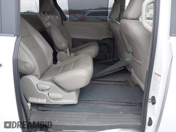 2015 Toyota Sienna XLE with VIN 5TDYK3DC9FS595827, listed as a IAAI auction lot 41014820 with 119,143 mi miles. Bid and sale history available at carsss.com. Image 8.