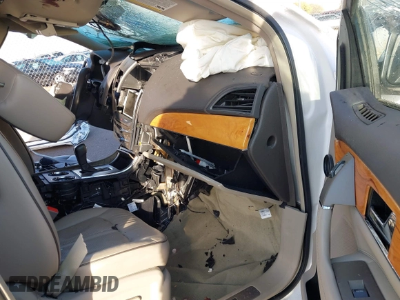 2014 Lincoln MKX with VIN 2LMDJ8JK4EBL10770, listed as a IAAI auction lot 40694091 with 106,354 mi miles. Bid and sale history available at carsss.com. Image 5.
