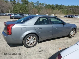 2005 Cadillac CTS z VIN 1G6DP567950113602, wystawiony jako Copart lot #51517115 z przebiegiem 155 393 mil mil oraz Czysty tytuł • Clean title. Historia ofert i sprzedaży dostępna na DreamBid. Obrazek 3.