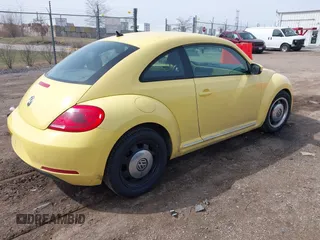 2012 Volkswagen Beetle 2.5L PZEV with VIN 3VWJP7AT3CM659061, listed as a IAAI auction lot 41935151 with 101,339 mi miles. Bid and sale history available at carsss.com. Image 4.