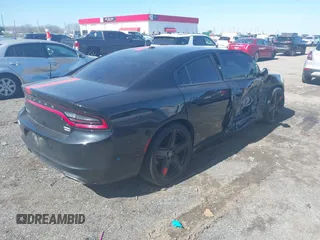 2020 Dodge Charger SXT with VIN 2C3CDXBG2LH229627, listed as a IAAI auction lot 41596342 with 124,012 mi miles and . Bid and sale history available at DreamBid. Image 4.