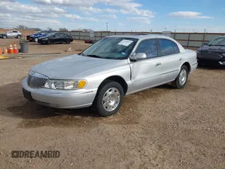 1998 Lincoln Continental with VIN 1LNFM97V8WY637860, listed as a IAAI auction lot 41746814 with 167,544 mi miles. Bid and sale history available at carsss.com. Image 2.