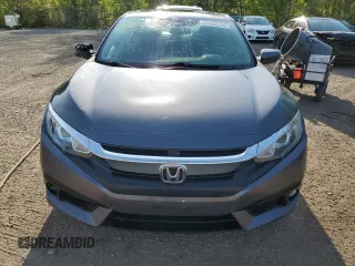 2016 Honda Civic EX-T with VIN 2HGFC1F44GH114785, listed as a Copart auction lot 57383755 with 168,529 mi miles and Salvage title. Bid and sale history available at DreamBid. Image 5.