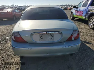 2003 Jaguar S-Type with VIN SAJEA01T93FM46260, listed as a Copart auction lot 87573835 with 129,563 mi miles and Clean Title. Bid and sale history available at DreamBid. Image 6.