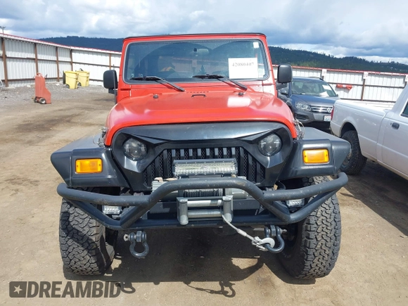 2005 Jeep Wrangler X with VIN 1J4FA39S35P358201, listed as a IAAI auction lot 42080407 with 130,110 mi miles. Bid and sale history available at carsss.com. Image 13.