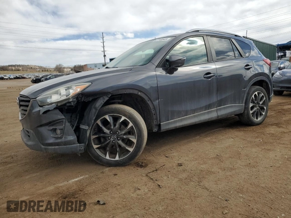 2016 Mazda CX-5 Grand Touring z VIN JM3KE4DY0G0633861, wystawiony jako Copart lot #47748645 z przebiegiem 112 219 mil mil oraz Szkoda całkowita • Salvage title. Historia ofert i sprzedaży dostępna na DreamBid. Obrazek 1.