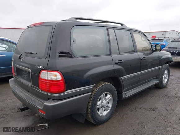 2000 Lexus LX 470 with VIN JT6HT00W0Y0111570, listed as a IAAI auction lot 41294897 with 276,909 mi miles. Bid and sale history available at carsss.com. Image 4.