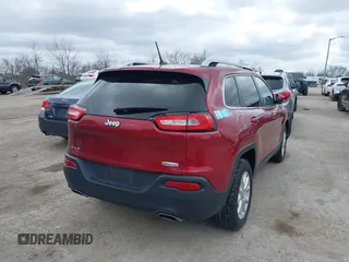 2015 Jeep Cherokee North with VIN 1C4PJMCS9FW674475, listed as a IAAI auction lot 41971771 with 186,376 mi miles. Bid and sale history available at carsss.com. Image 4.