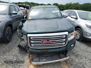 2016 GMC Canyon 4WD SLT z VIN 1GTG6DE31G1286565, wystawiony jako Copart lot #57261625 z przebiegiem 85 664 mil mil oraz Tytuł czysty. Historia ofert i sprzedaży dostępna na DreamBid. Obrazek 5.