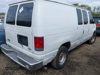 2003 Ford Econoline Cargo with VIN 1FTNE24223HC04321, listed as a IAAI auction lot 42015261 with 183,098 mi miles. Bid and sale history available at carsss.com. Image 4.