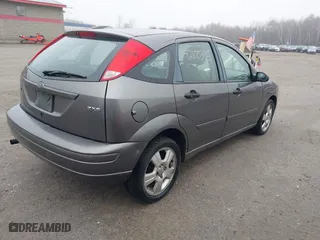 2006 Ford Focus S with VIN 1FAFP37N26W180795, listed as a IAAI auction lot 42100395 with 125,002 mi miles. Bid and sale history available at carsss.com. Image 4.