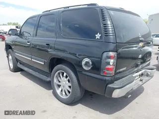 2005 Chevrolet Tahoe Z71 with VIN 1GNEC13T35R243319, listed as a IAAI auction lot 42021248 with 301,747 mi miles. Bid and sale history available at carsss.com. Image 3.