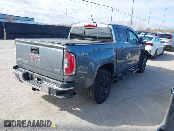 2019 GMC Canyon 4WD SLE with VIN 1GTG6CEN6K1352824, listed as a IAAI auction lot 41875753 with 60,684 mi miles. Bid and sale history available at carsss.com. Image 4.