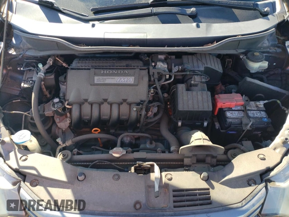 2010 Honda Insight EX with VIN JHMZE2H73AS039935, listed as a Copart auction lot 46192575 with 127,329 mi miles and Salvage Title. Bid and sale history available at DreamBid. Image 11.