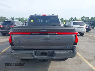2023 Ford F-150 Lightning Pro с VIN 1FT6W1EVXPWG49668, выставлен на аукционе IAAI как лот 42269881 с пробегом 15 012 миль миль и . История ставок и продаж доступна на DreamBid. Изображение 16.