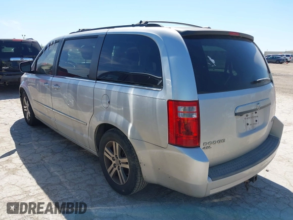 2010 Dodge Grand Caravan SXT with VIN 2D4RN5DX8AR124993, listed as a IAAI auction lot 42250336 with 179,778 mi miles and . Bid and sale history available at DreamBid. Image 3.