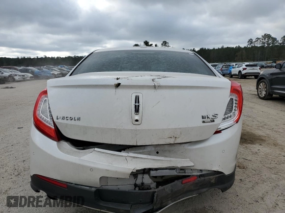 2013 Lincoln MKS EcoBoost with VIN 1LNHL9FT0DG607721, listed as a Copart auction lot 85129344 with 158,191 mi miles and Salvage title. Bid and sale history available at DreamBid. Image 6.