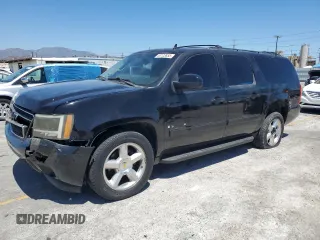 2009 Chevrolet Suburban 2LT z VIN 1GNFC26059R277392, wystawiony jako Copart lot #63123855 z przebiegiem 140 843 mil mil oraz Szkoda całkowita • Salvage title. Historia ofert i sprzedaży dostępna na DreamBid. Obrazek 1.