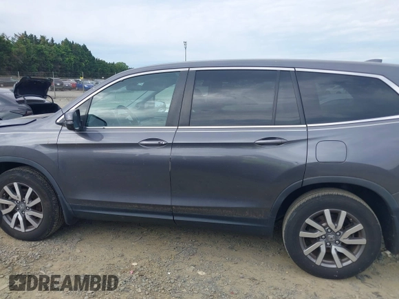2019 Honda Pilot EX-L with VIN 5FNYF5H45KB018293, listed as a IAAI auction lot 42318481 with 76,617 mi miles and . Bid and sale history available at DreamBid. Image 14.