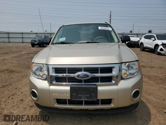 2011 Ford Escape XLS with VIN 1FMCU0C75BKC58172, listed as a Copart auction lot 60492825 with 114,518 mi miles and Salvage title. Bid and sale history available at DreamBid. Image 5.