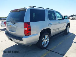 2013 Chevrolet Tahoe LT with VIN 1GNSCBE07DR164486, listed as a IAAI auction lot 42216421 with 220,395 mi miles and . Bid and sale history available at DreamBid. Image 4.