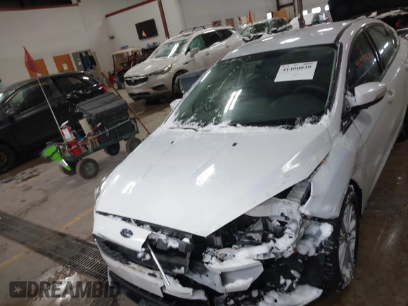 2017 Ford Focus SE with VIN 1FADP3F24HL219177, listed as a IAAI auction lot 41400039 with 88,033 mi miles and . Bid and sale history available at DreamBid. Image 12.