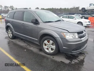 2013 Dodge Journey SE with VIN 3C4PDCAB4DT500983, listed as a IAAI auction lot 41605766 with 222,196 mi miles. Bid and sale history available at carsss.com. Image 1.