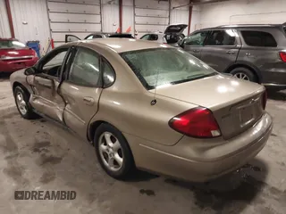 2003 Ford Taurus SES Standard with VIN 1FAFP552X3G184894, listed as a IAAI auction lot 41846677 with 160,824 mi miles. Bid and sale history available at carsss.com. Image 3.