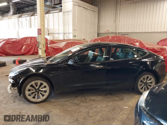 2022 Tesla Model 3 with VIN 5YJ3E1EA4NF187113, listed as a IAAI auction lot 41712331 with 81,879 mi miles and . Bid and sale history available at DreamBid. Image 15.