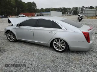 2014 Cadillac XTS Luxury z VIN 2G61M5S35E9259709, wystawiony jako Copart lot #51222425 z przebiegiem 110 081 mil mil oraz Szkody całkowita. Historia ofert i sprzedaży dostępna na DreamBid. Obrazek 2.