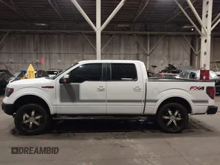 2013 Ford F-150 XL with VIN 1FTFW1ET7DFA81499, listed as a IAAI auction lot 41302118 with 153,976 mi miles. Bid and sale history available at carsss.com. Image 14.