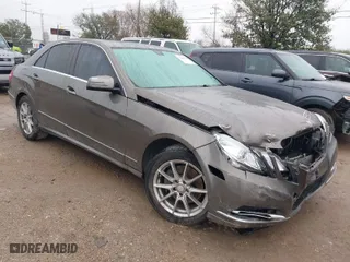 2013 Mercedes-Benz E-Class E 350 Luxury with VIN WDDHF5KB0DA727576, listed as a IAAI auction lot 41546228 with 164,599 mi miles. Bid and sale history available at carsss.com. Image 1.
