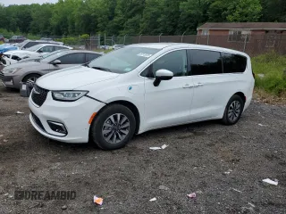 2023 Chrysler Pacifica Hybrid Touring L z VIN 2C4RC1L75PR541042, wystawiony jako Copart lot #59113875 z przebiegiem 49 916 mil mil oraz Nie do naprawy • Non repairable. Historia ofert i sprzedaży dostępna na DreamBid. Obrazek 1.