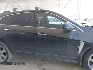 2012 Cadillac SRX Premium Collection with VIN 3GYFNCE39CS548523, listed as a IAAI auction lot 41854695 with 145,311 mi miles and . Bid and sale history available at DreamBid. Image 13.