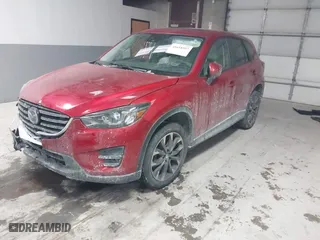 2016 Mazda CX-5 Grand Touring with VIN JM3KE4DY8G0622347, listed as a IAAI auction lot 41618997 with NaN miles. Bid and sale history available at carsss.com. Image 18.