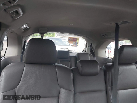 2011 Honda Odyssey Touring with VIN 5FNRL5H93BB104906, listed as a IAAI auction lot 42371279 with 183,856 mi miles and . Bid and sale history available at DreamBid. Image 8.