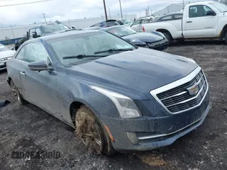 2016 Cadillac ATS Luxury Collection RWD z VIN 1G6AB1RX7G0147787, wystawiony jako IAAI lot #41860014 z przebiegiem 79 424 mil mil oraz . Historia ofert i sprzedaży dostępna na DreamBid. Obrazek 1.