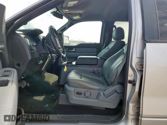 2014 Ford F-150 XL with VIN 1FTFW1ET0EKG04449, listed as a Copart auction lot 62642725 with 223,472 mi miles and Salvage title. Bid and sale history available at DreamBid. Image 7.