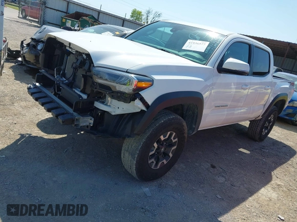 2023 Toyota Tacoma SR z VIN 3TYCZ5AN5PT151681, wystawiony jako IAAI lot #41936577 z przebiegiem 30 056 mil mil oraz . Historia ofert i sprzedaży dostępna na DreamBid. Obrazek 18.
