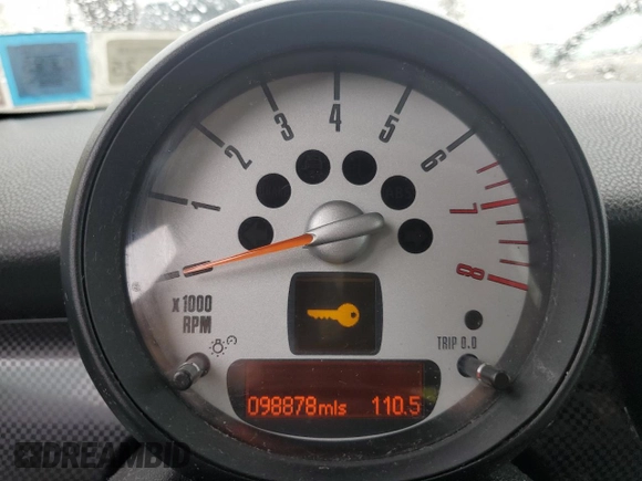 2013 MINI Hardtop S with VIN WMWSV3C50DT477984, listed as a Copart auction lot 56190855 with 98,878 mi miles and Salvage Title. Bid and sale history available at DreamBid. Image 9.