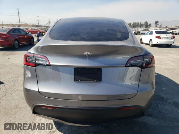 2024 Tesla Model Y Long Range с VIN 7SAYGAEE6RF131749, выставлен на аукционе Copart как лот 74548014 с пробегом 1 042 миль миль и Списание • Salvage title. История ставок и продаж доступна на DreamBid. Изображение 6.
